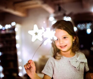 Beautiful little girl with a sparkler at Christmas | winter in Lancaster PA