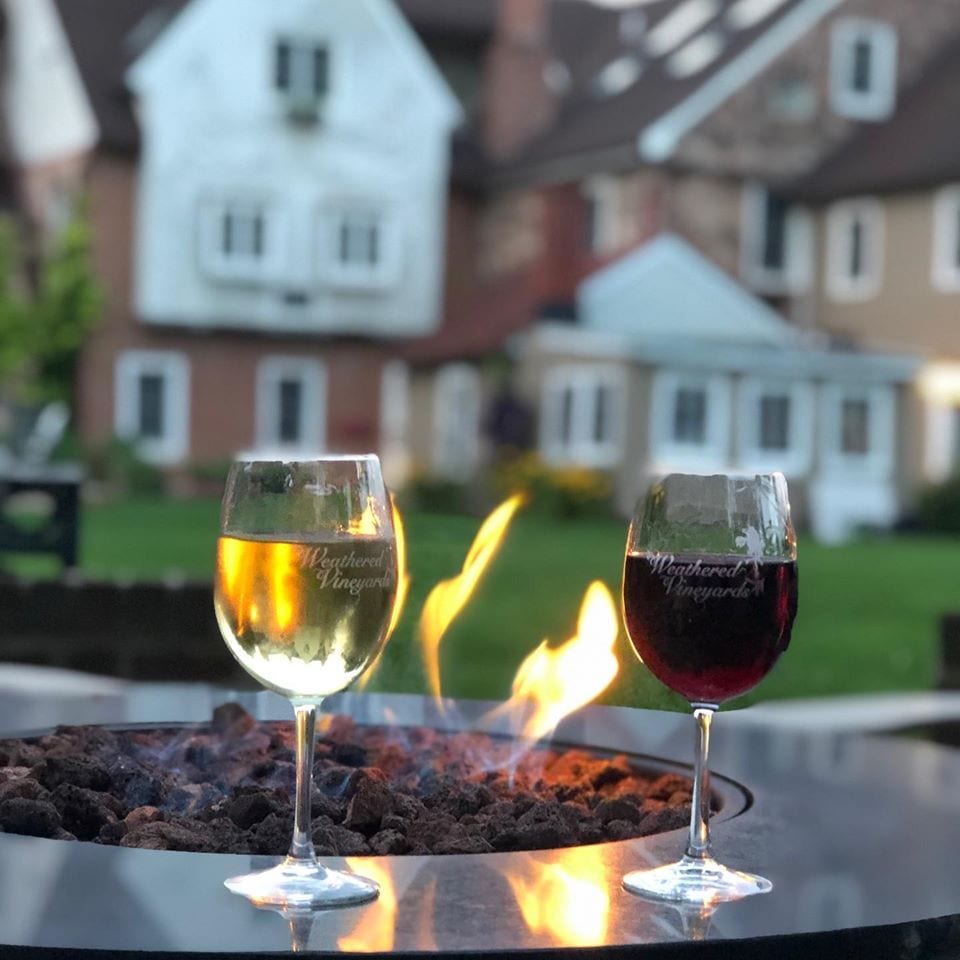 Wine glasses by the fire at our Lancaster Bed and Breakfast this fall